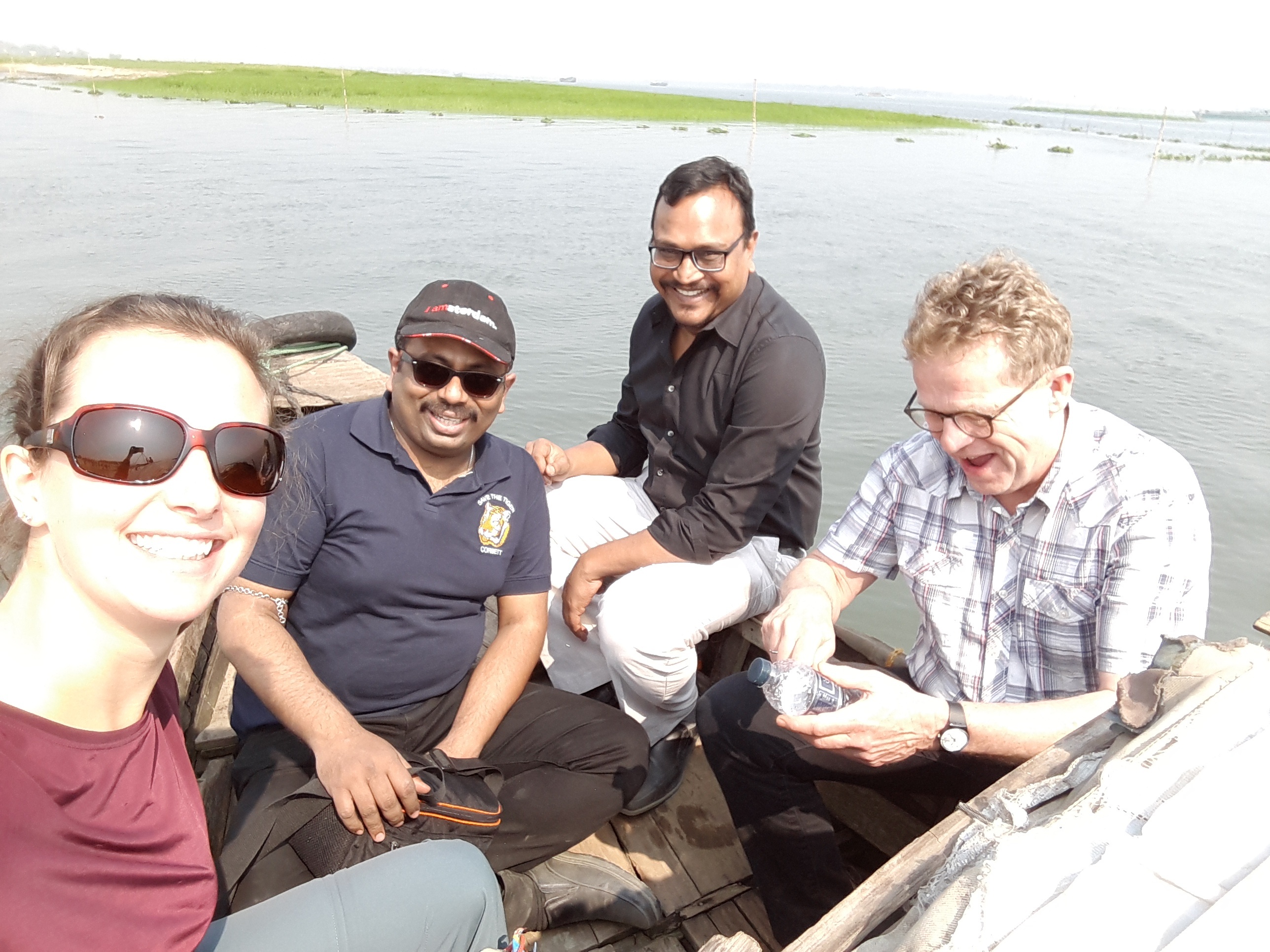 Team members Sheila (Deltares), Ayan (Akvo), Gabriel (ECL), and Hans (Deltares) taking water quality measurements on the Meghna River in February 2017.
